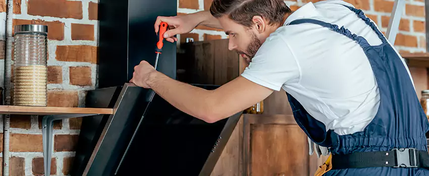 Old Rusted Metal Fireplace Repair And Replacement in Cimarron, AB